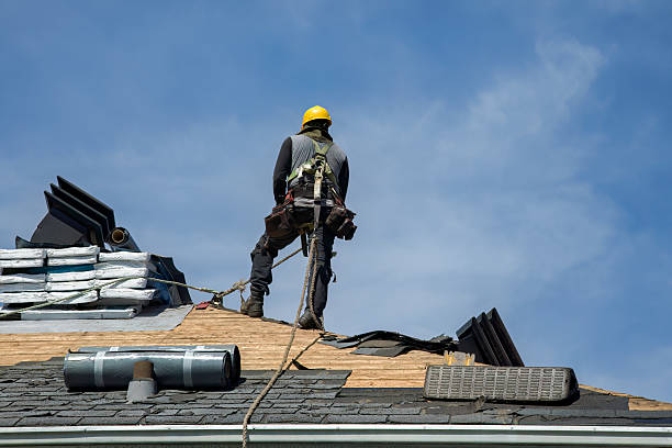 Professional Gutter Installation technician working in Putnamville, IN